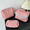 Bolsa de cosméticos portátil gran capacidad floral pequeño almacenamiento portátil algodón acolchado flor linda ins viaje estudiante