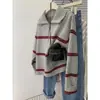 Suéter a rayas con cuello polo y media cremallera para mujer, primavera, otoño e invierno, jersey de punto casual, nuevo estilo 2026