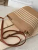 Uma geração de bolsa de ombro feminina de cabelo, bolsa tecida de corda de algodão listrada, bolsa diagonal tecida simples moderna, bolsa de praia atacado