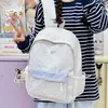 Mochila de estilo casual y simple para estudiantes mujeres, gran capacidad, ligera, versátil, mochila diaria estilo universitario 2026