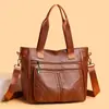 Bolso de mujer de gran capacidad 2026 nuevo modelo bolso de hombro bolso de mano tipo tote vintage para el trabajo bolso cruzado con múltiples compartimentos