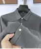 Camisa Versátil Nueva de Manga Larga Vintage para Hombre, Top de Trabajo, Chaqueta Camisa Casual de Color Sólido, Primavera y Otoño 2026