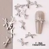 Nuevas Explosiones Accesorios para Uñas Usar Uñas Uñas Aleación Hueco Mini Tridimensional Mariposa Lazo Joyería Fábrica