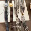 Otoño e Invierno Malla de Tela Flor Collar Cadena para Suéter Elegante de Moda para Mujer High-End 2025 Nuevo