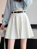 Falda midi plisada de lana tejida blanca para mujer, adecuada para primavera y otoño, falda de línea A de cintura alta que acentúa las caderas, combinada con botas largas o usada como falda corta