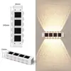 Lámpara solar de jardín para exteriores, lámpara de pared para el hogar, diseño decorativo, valla, pared, nuevo estilo, lámpara de pared con ambiente luminoso de arriba a abajo.