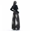 Jeans de pierna ancha en mezclilla lavada color naranja joven para mujer, con diseño de salpicaduras de tinta desgastadas, corte holgado, efecto adelgazante y estilo versátil y elegante de pierna curva