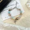 Nuevo Pulsera Tejida a Mano con Concha de Estrella de Mar y Caracola Estilo Oceánico Vacaciones en la Playa y la Costa Joyería de Pulsera de Nicho para Mujeres