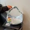 Bolsa de Tecido de Nylon Leve e Versátil para Mulheres 2025 Nova Bolsa Transversal de Viagem de Verão Bolsa de Ombro Único da Moda Tipo Bolinho