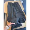 Pantalones anchos de corte holgado y estilizado para adolescentes, unisex, con un elegante diseño de patchwork y estampado de cuadros, adecuados para primavera y otoño