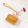 2026 Nuevo Modelo Colgante para Bolso de Piel Sintética con Hebilla de Candado, Accesorio de Moda Unisex, Colgante Decorativo Simple de Moda