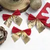 Novas decorações de árvore de Natal em laço nas cores duplas vermelho e dourado/vermelho e prata, uma ferramenta mágica para criar uma atmosfera festiva