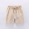 Pantalones cortos de niño hot pants 2020 nuevos de algodón y lino estilo coreano casual de verano modernos deportivos moda precio de fábrica al por mayor