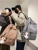 2024 Nueva Mochila Escolar para Mujer Simple para Estudiantes de Secundaria y Preparatoria Mochila Casual para Hombre Resistente a Manchas Gran Capacidad Transfronteriza