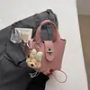 Bolso Único con Textura Bolso Tote Pequeño para Mujer Primavera 2026 Nuevo Bolso Cubo Simple Bolso de Hombro Cruzado Set