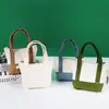 Bolsa de lona mini personalizada transfronteriza para guardar audífonos, llaves y labial, monedero mini colorido de patchwork