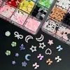 Set de 12 Piezas de Flor de Cinco Pétalos Empacado en Caja Corazón de Perla Mariposa Cinta Accesorios de Uñas de Resina Venta Caliente Transfronteriza al por Mayor