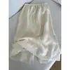 Atacado em estoque do fabricante: Saia feminina cor damasco creme, tamanho petite, com design de fenda, cintura alta, efeito emagrecedor