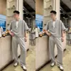 Conjunto de dos piezas nuevo, moderno y único para primavera, color liso, moda masculina, simple, casual, versátil, manga corta, pantalones largos