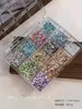 Venta Caliente Transfronteriza 12 Compartimentos Set de Pedrería Redonda para Uñas 2mm Pedrería Multicolor de Dorso Plano Súper Brillante Accesorios de Decoración DIY para Uñas Al por Mayor