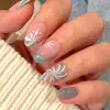Coleção de nail art de Natal transfronteiriça: Pontas de unha pré-desenhadas, prontas para usar e adesivos para unhas postiças, 24 peças, designs de nail art de Natal removíveis