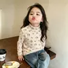 Nueva Colección Otoño/Invierno 2026: Top de Terciopelo Alemán con Cuello Medio para Niñas, Diseño de Dibujos Animados, Capa Base Versátil y Elegante para Niños Mayores