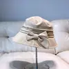 Chapéu de Pescador Elegante com Laço Moda Feminino Primavera e Verão Estilo Coreano Viagem de Férias Proteção Solar Chapéu de Sol Casual Versátil Chapéu Balde