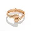 Pulseiras Populares Transfronteiriças Europeias e Americanas Ins Normcore Pulseiras Assimétricas com Padrão de Onda Pulseiras Metálicas Brilhantes Joias Femininas