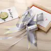 49 flores de tirón suministros para celebración de bodas cinta de lazo caja de regalo de boda empaque decoración de coche de boda tirador de manija de puerta flores de tirón al por mayor