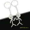Chaveiro de chaveiro de casal com grafite de aço inoxidável exclusivo transfronteiriço pingente grande stickman