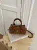 Bolso de mano Boston moderno retro transfronterizo para mujer, nuevo bolso de almohada esmerilada de moda para commuters, bolso de hombro y cruzado