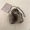 Bolsa pequena tipo balde macia e fofa para outono e inverno com textura de pintas, uma bolsa tote estilo retrô com uma alça de corrente única para usar na transversal, projetada para mulheres