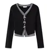 Conjunto de ropa de mujer para principios de otoño talla grande 2026: Cárdigan de punto falso adelgazante + falda plisada, elegante conjunto de dos piezas