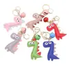 Llavero de Dinosaurio de Dibujos Animados Colgante para Bolso de Piel PU Llavero de Campana de Cuero Personalizado Llavero de Coche Colgantes de Regalo