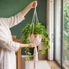 Nueva bolsa de red para macetas de alta resistencia transfronteriza con cuerda de lino y algodón y gancho para cestas colgantes de plantas decorativas interiores y exteriores