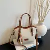 Bolsa Grande e Fashion para o Dia a Dia de Mulher 2026 Novo Estilo Transfronteiriço Bolsa de Mão e Bolsa de Ombro Versátil de Alta Qualidade