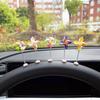 Decoración de coche, pequeño molino de viento, nuevos accesorios curativos para el interior, consola central giratoria creativa para el coche, adornos con cabeza temblorosa