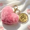 Regalos pequeños y prácticos para el Festival de Medio Otoño: campanilla de conejo rosa, moneda de la fortuna, llavero de pastel de luna, recuerdos promocionales corporativos