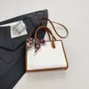Bolsa Grande de Nicho Estilo Coreano para Mulheres 2026 Novo Modelo Bolsa de Ombro Único Transversal com Textura, Adequada para Aula e Trabalho Bolsa Tote
