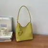 Bolsa de Hombro/Axila Versátil de Moda Exquisita de Diseño de Nicho de Gama Alta para Viajes de Negocios de Verano 2026