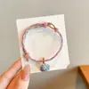 Pulseira de corda colorida zongzi do Festival do Barco-Dragão 2026 novo modelo pulseira trançada artesanal étnica infantil atacado corda vermelha