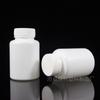 En stock venta al por mayor botella de plástico de 100 gml botella sólida blanca PE a prueba de luz sub-botella botella para polvo botella vacía