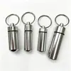 Llavero de aleación de aluminio para exteriores con abrebotellas, mini contenedor de pastillas impermeable, frasco de pastillas de emergencia, caja pequeña de pastillas sellada y a prueba de humedad