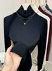 Camiseta Base de Cuello Alto Estilo Europeo para Mujer, Otoño e Invierno 2025, Elegante y Cálida de Manga Larga, Camiseta Lisa de Hombro Normal