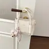 Bolso de Cubo Portátil Exquisito Versátil Estilo Coreano para Mujer 2026 Nuevo Simple Personalidad Casual Bolso de Hombro Cruzado