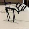 Superventas transfronterizo Estatuas de Reno Negro juego de 2 piezas de aleación estatua de reno negro decoración de escritorio