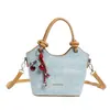 2026 Nuevo Bolso de Mano Estilo Coreano de Comercio Exterior Transfronterizo Bolso de Hombro de Moda Bolso Cubo Simple Elegante para Mujer Bolso Cruzado
