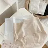 Saia Xiaolan M010 Bolinhas Retrô Algodão 100S Ultrafino de Fibra Longa Roupa Íntima Feminina Cintura Média Amiga da Pele Respirável Cueca Fio Dental Sem Costura