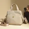 Bolso de Mano de Múltiples Capas de Gran Capacidad a la Moda para Comercio Exterior, Bolso de Hombro Simple de Nylon Nuevo 2026, Bolso Cruzado para Mujer
