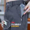 Pantalones casuales versátiles de múltiples bolsillos con cremallera al por mayor transfronterizos para hombre, estilo nuevo fino de primavera y otoño, pantalones rectos holgados de negocios para hombre
